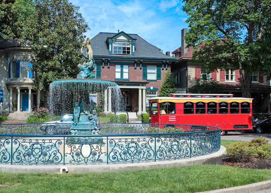 Old Fashioned Express trolley tour at Old Louisville ST James Court fountain