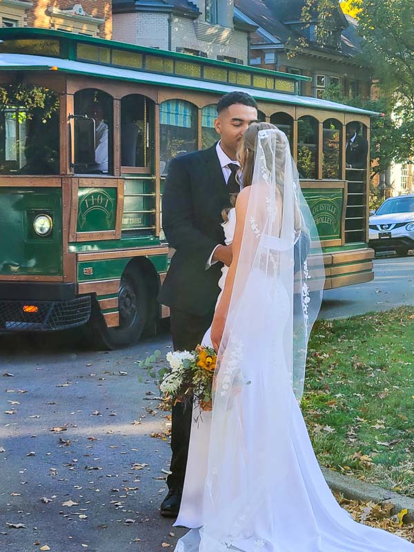 Bride and groom sharing a first look instead of the Louisville trolley wedding shuttle
