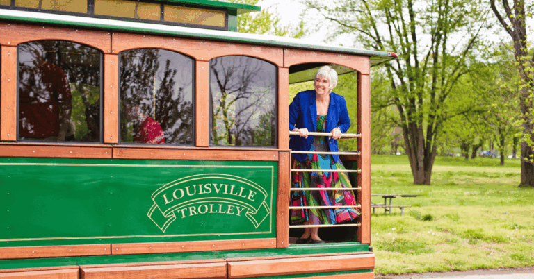 Trolley in Louisville KY with woman looking out from balcony