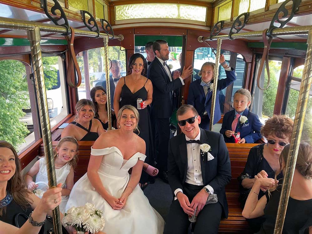 Wedding party inside the historic Toonerville trolley in Louisville Kentucky